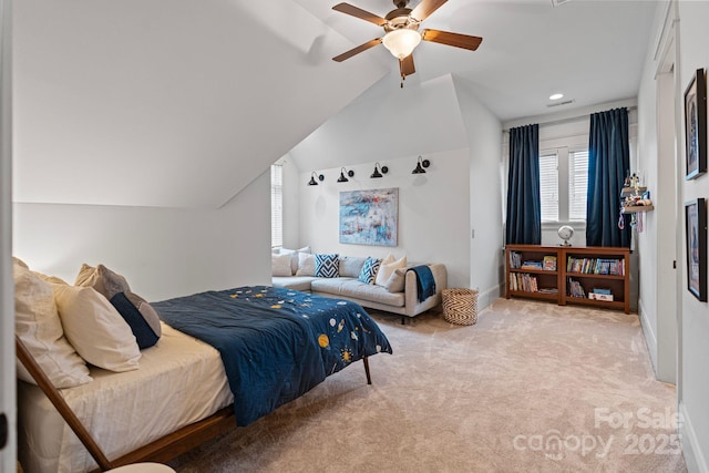 bedroom with vaulted ceiling, a ceiling fan, baseboards, and carpet floors