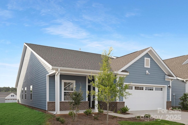 25966 Appleyard Ct Unit 1205, Lancaster, SC 29720 - view of front of property with brick siding, concrete driveway, a front lawn, and roof with shingles