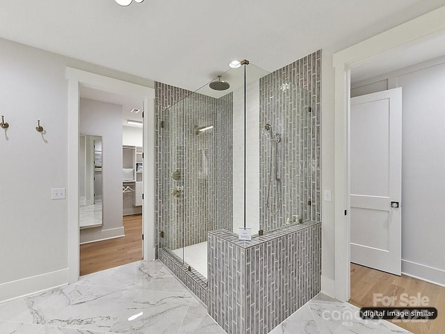 19419 Youngblood Rd W Unit 2, Charlotte, NC 28278 - full bathroom with a tile shower, marble finish floor, and baseboards