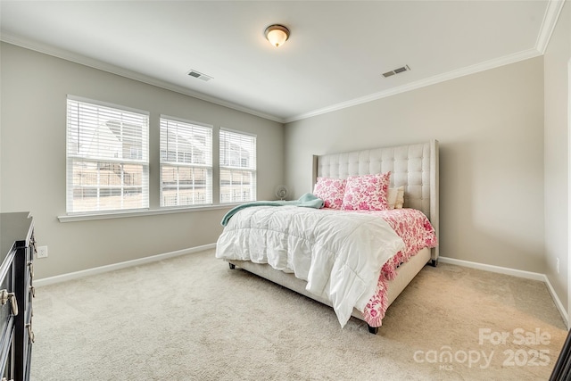 bedroom with carpet floors, visible vents, and baseboards