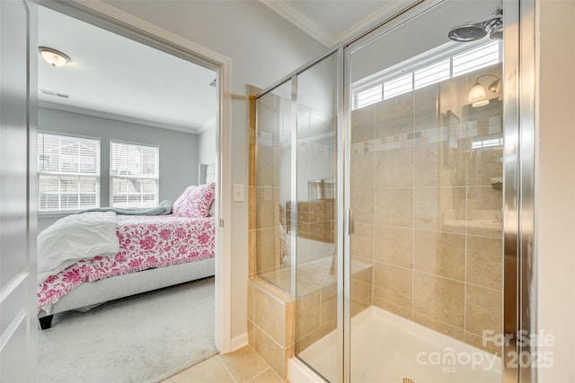 ensuite bathroom with ornamental molding, connected bathroom, and a shower stall