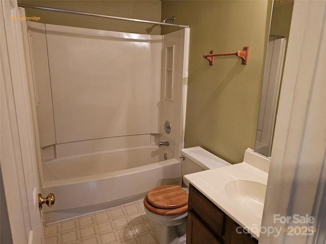 bathroom featuring toilet, bathtub / shower combination, vanity, and tile patterned floors