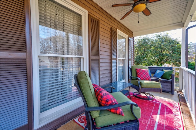 balcony featuring ceiling fan