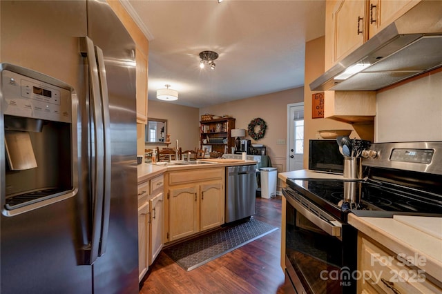 kitchen featuring light brown cabinets, under cabinet range hood, stainless steel appliances, light countertops, and dark wood-style floors