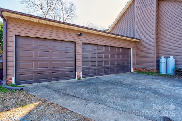 garage with driveway