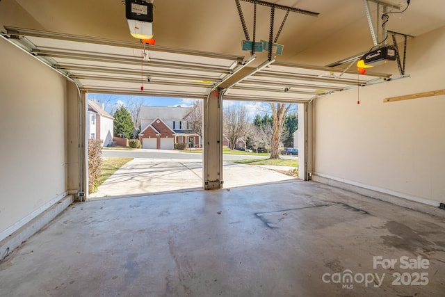 garage featuring a garage door opener