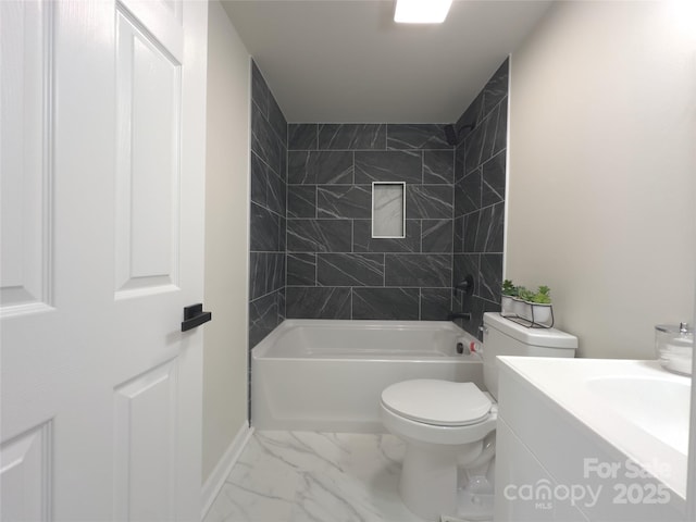 bathroom featuring toilet, vanity, baseboards, marble finish floor, and shower / washtub combination