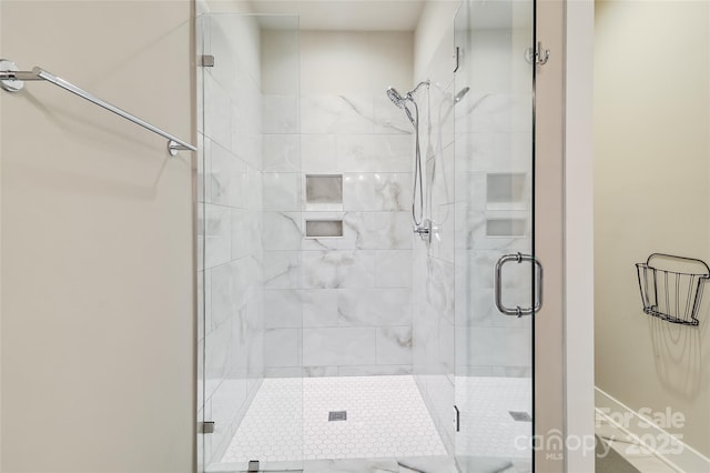 bathroom featuring a shower stall