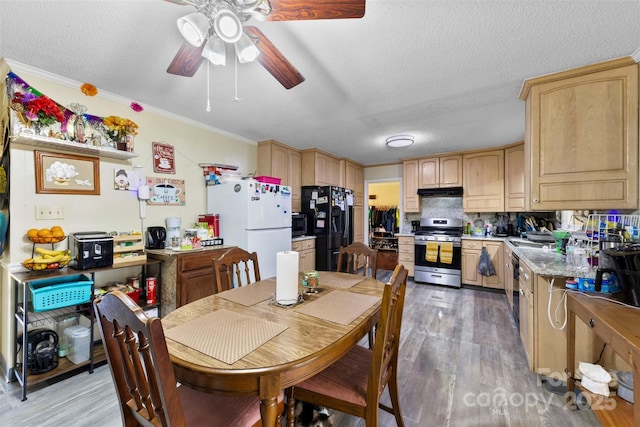 4937 Lebanon Dr Unit 1, Charlotte, NC 28273 - dining space featuring light wood finished floors, ceiling fan, ornamental molding, and a textured ceiling