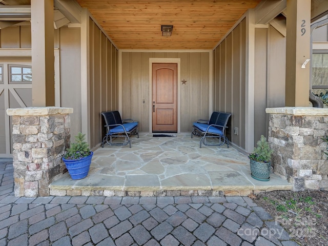 entrance to property featuring a patio