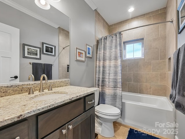 bathroom featuring tile patterned flooring, toilet, vanity, shower / bath combination with curtain, and crown molding