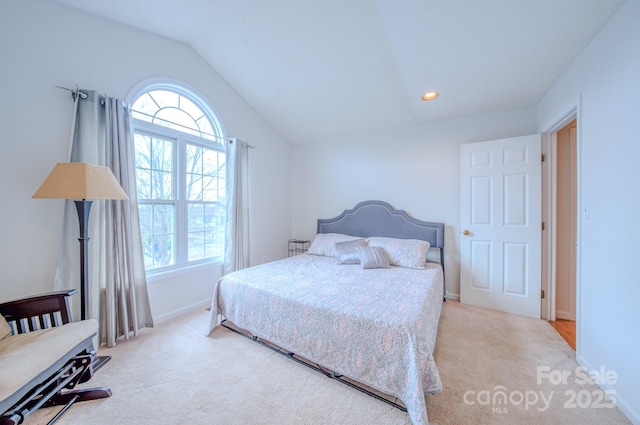 carpeted bedroom with lofted ceiling, recessed lighting, and baseboards