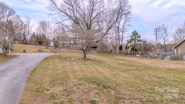 view of yard with fence