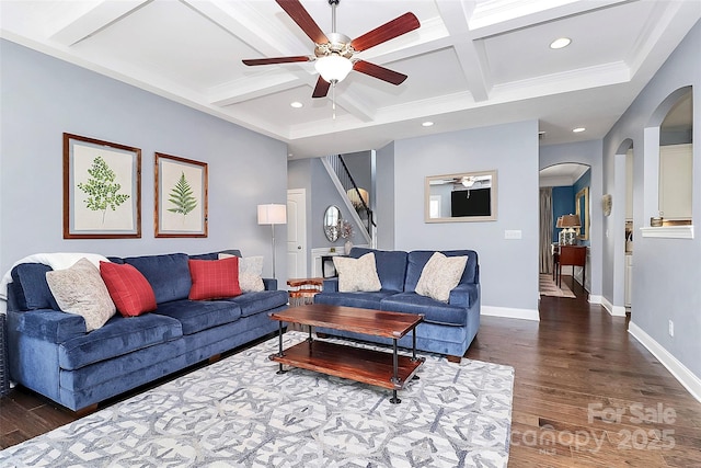 living room with dark wood-style flooring, coffered ceiling, and baseboards