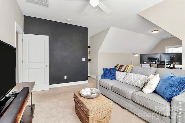 living room with visible vents, light carpet, vaulted ceiling, ceiling fan, and baseboards