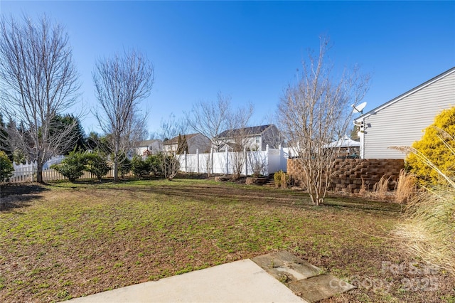 view of yard with fence