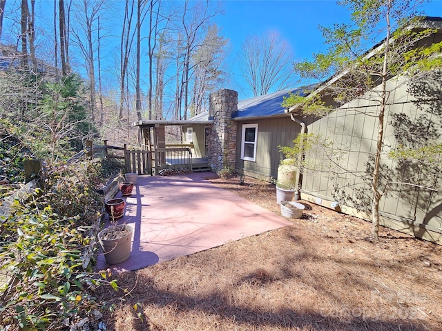 rear view of house featuring a patio area