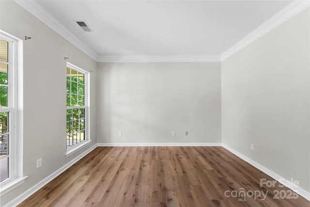 329 Squirrel Ln, Clover, SC 29710 - empty room featuring wood finished floors and ornamental molding