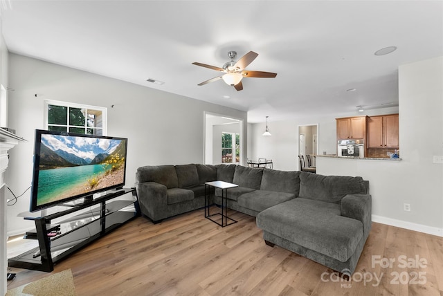 329 Squirrel Ln, Clover, SC 29710 - living area featuring ceiling fan and light wood-style floors