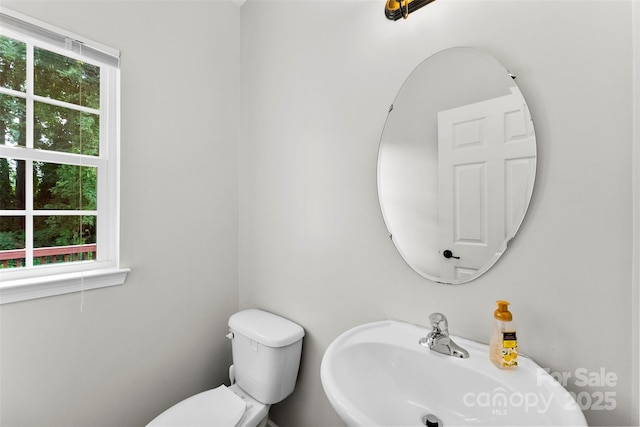 329 Squirrel Ln, Clover, SC 29710 - half bath featuring a sink and toilet