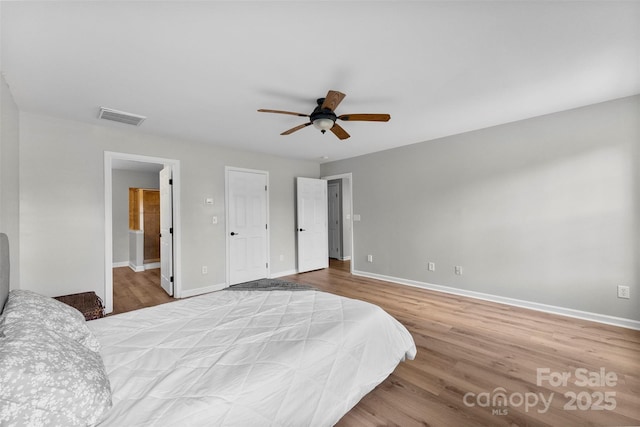 329 Squirrel Ln, Clover, SC 29710 - bedroom with wood finished floors and a ceiling fan