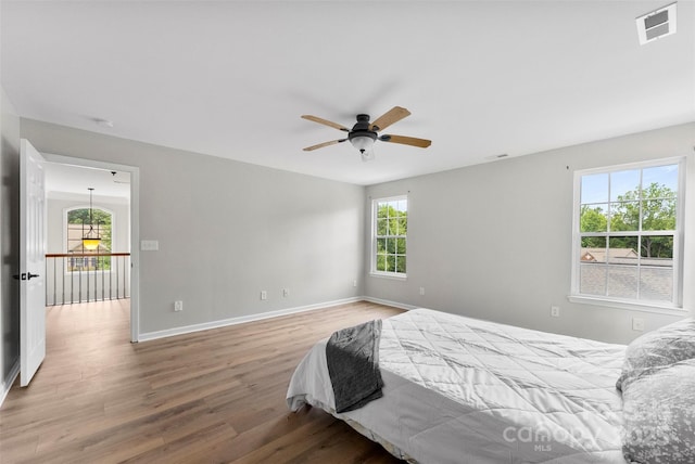 329 Squirrel Ln, Clover, SC 29710 - bedroom with wood finished floors and ceiling fan
