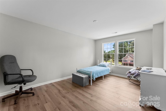 329 Squirrel Ln, Clover, SC 29710 - bedroom featuring wood finished floors and baseboards