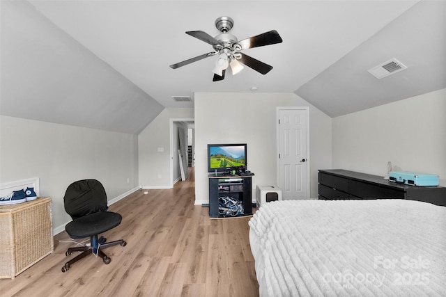 329 Squirrel Ln, Clover, SC 29710 - bedroom featuring lofted ceiling, light wood finished floors, and a ceiling fan