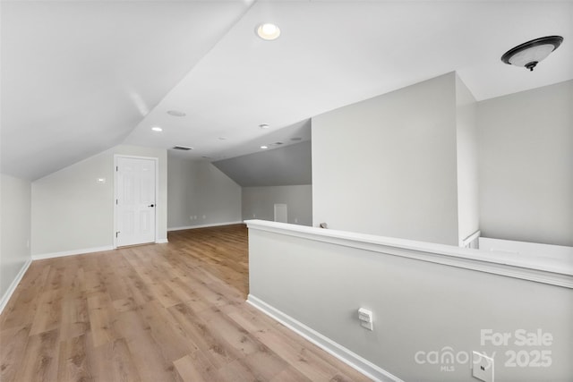 329 Squirrel Ln, Clover, SC 29710 - additional living space with light wood finished floors, vaulted ceiling, and recessed lighting