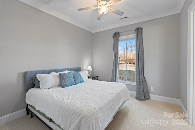 bedroom with ornamental molding, visible vents, and baseboards