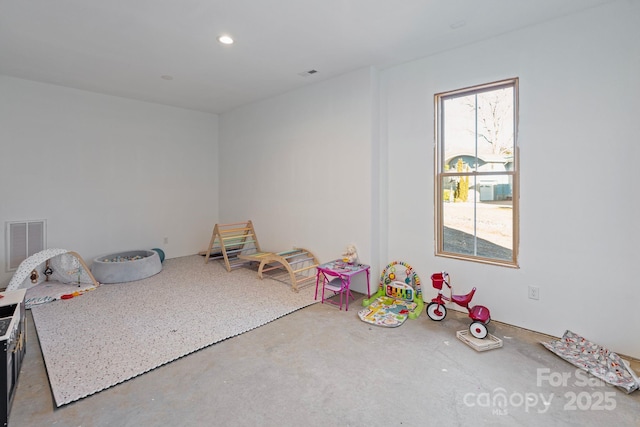 recreation room with concrete floors, visible vents, and recessed lighting