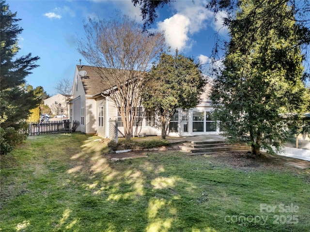 view of yard with fence