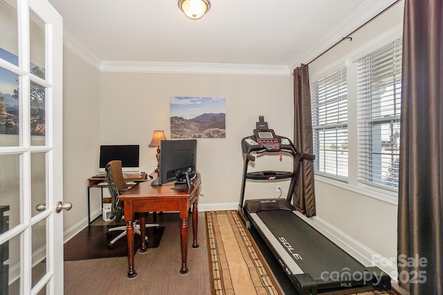 office area featuring french doors, crown molding, baseboards, and wood finished floors