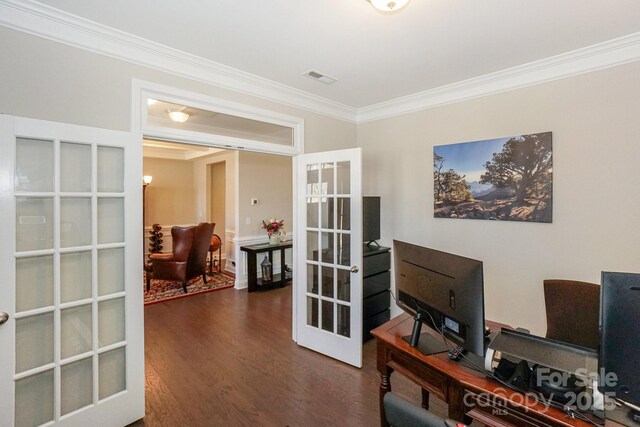 home office featuring ornamental molding, french doors, dark wood finished floors, and visible vents