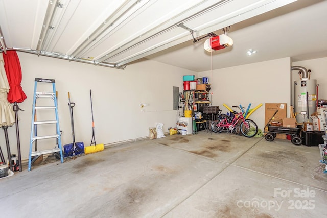 garage with water heater and a garage door opener