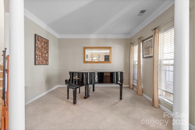 office space featuring baseboards, light colored carpet, visible vents, and crown molding