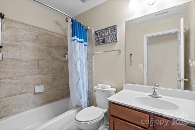 bathroom featuring toilet, visible vents, shower / bath combination with curtain, and vanity