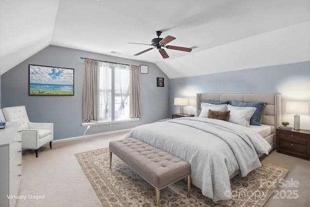 bedroom featuring visible vents, baseboards, light colored carpet, lofted ceiling, and ceiling fan