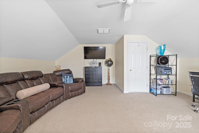 carpeted living area with vaulted ceiling, ceiling fan, visible vents, and baseboards