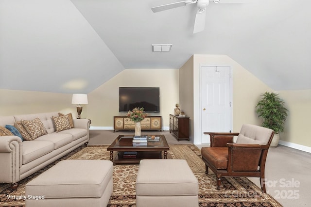 living area with ceiling fan, baseboards, visible vents, and vaulted ceiling