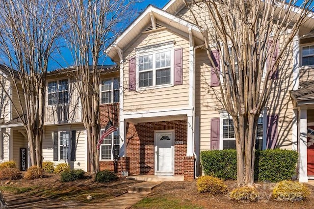 multi unit property with brick siding