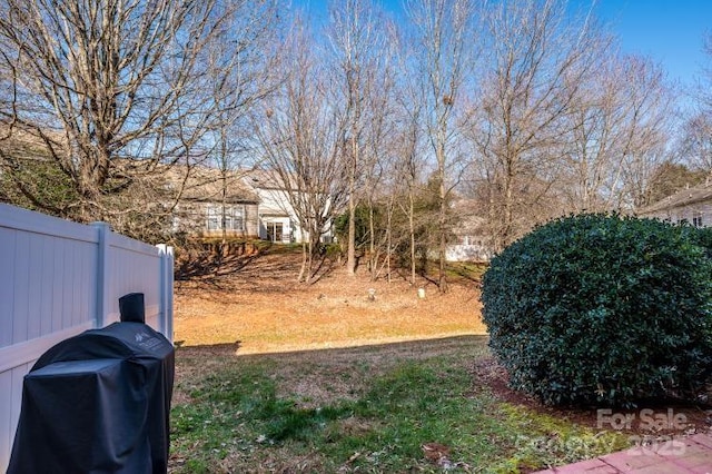 view of yard with fence