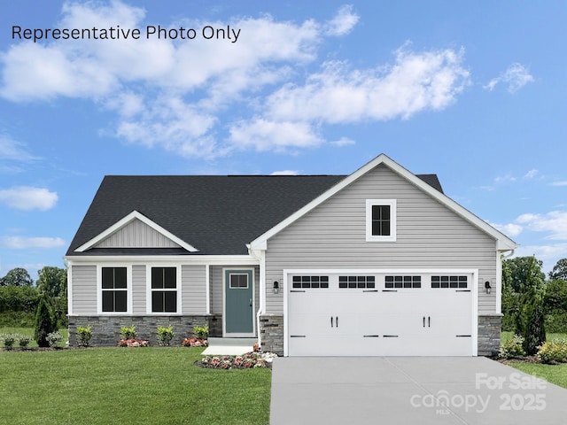 view of front of property featuring board and batten siding, stone siding, driveway, and a front lawn