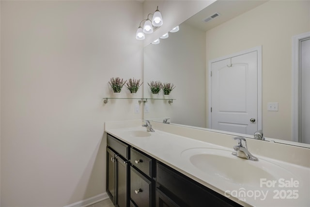 full bath with visible vents, a sink, and double vanity