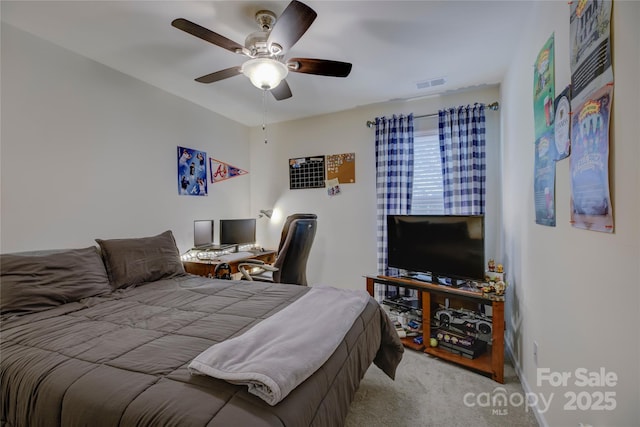 bedroom with a ceiling fan, carpet, and visible vents