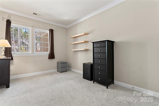 bedroom featuring baseboards, carpet flooring, visible vents, and crown molding