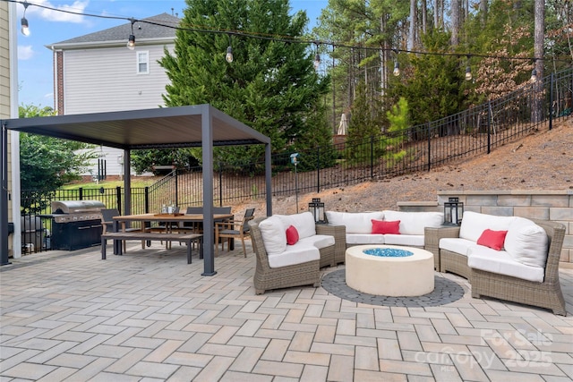 view of patio / terrace with outdoor dining space, an outdoor living space with a fire pit, fence, and grilling area