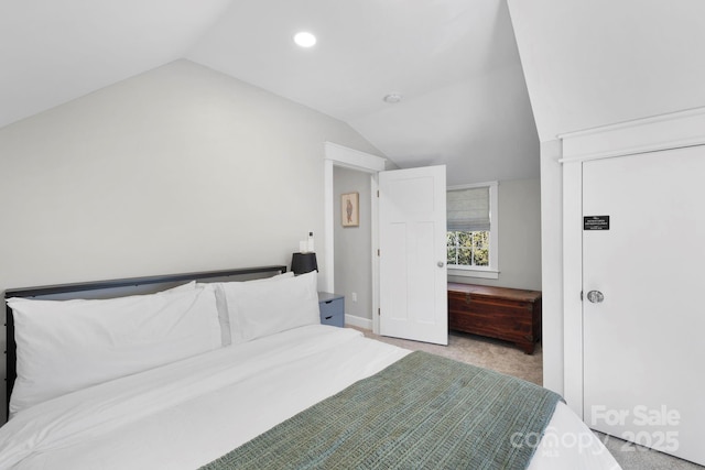 bedroom with recessed lighting, carpet floors, and vaulted ceiling