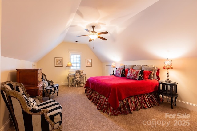 bedroom with carpet floors, ceiling fan, baseboards, and lofted ceiling