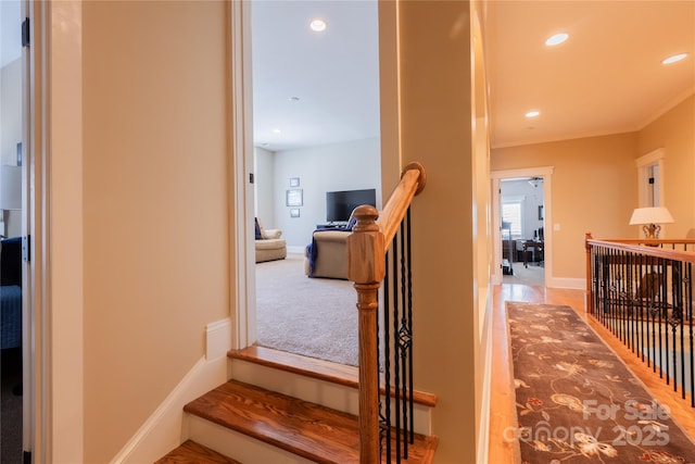 stairway with recessed lighting, carpet flooring, and baseboards